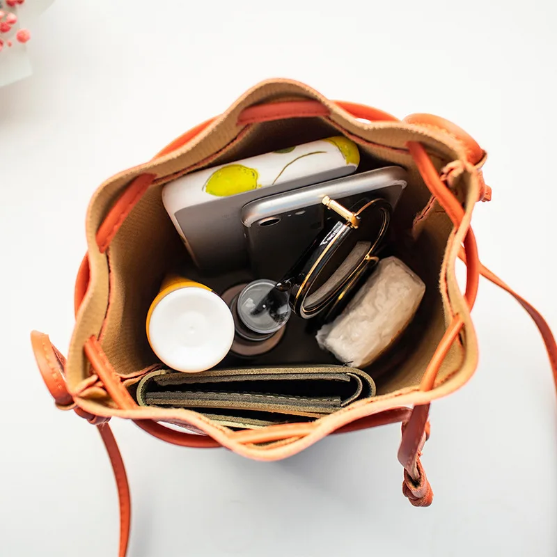 OkoLive 2022 Spring and Summer New Fashion Single Shoulder Bag Messenger Bag Bucket Bags Women's Bag Tassel Embossed Lattice