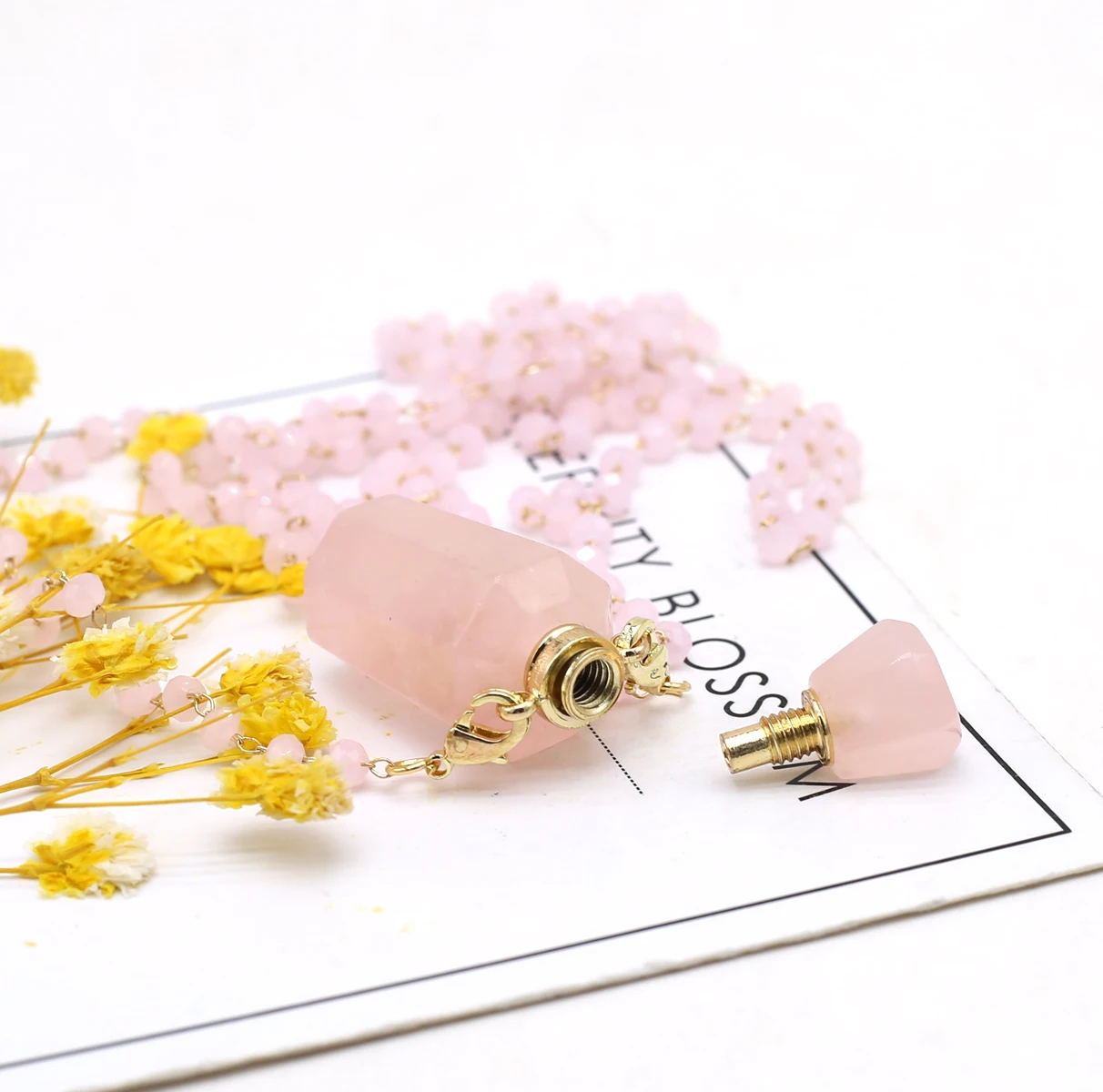 

Hot Selling Natural Semi-Precious Rose Quartz Essential Oil Diffuser Perfume Bottle Charm Pendant Necklace Jewelry Crystal Gift