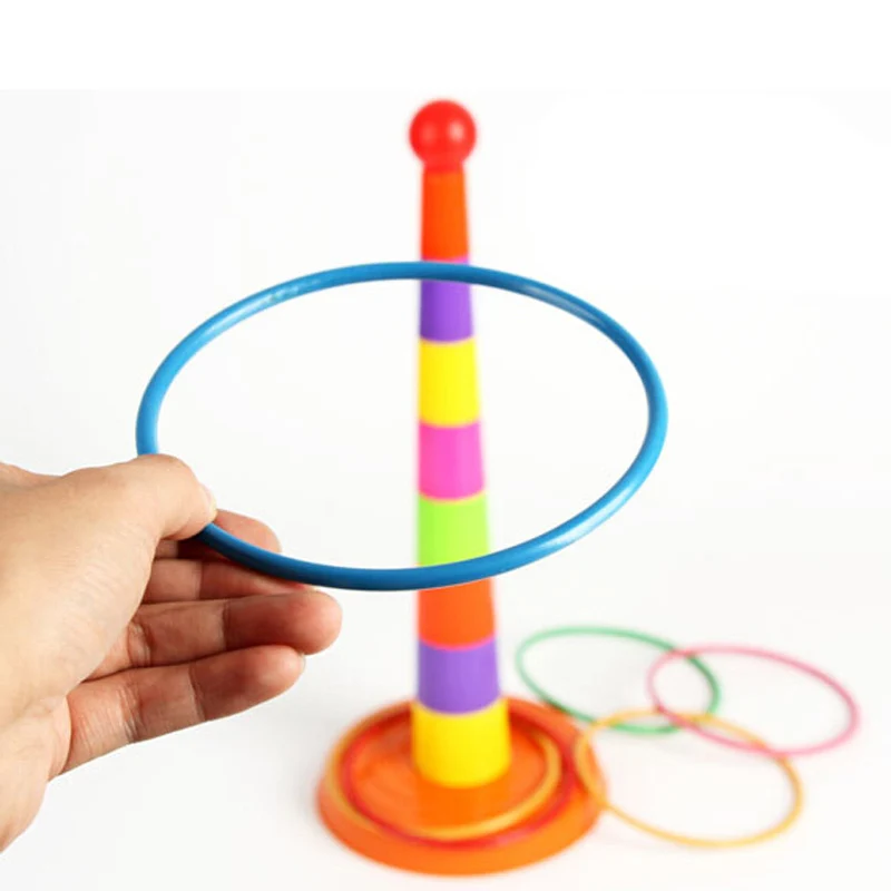 Бросать круги игра. Игрушка для метания колец. Игрушка кольцо для детей. Кольца для метания для детей. Детская игрушка кольца на палку.