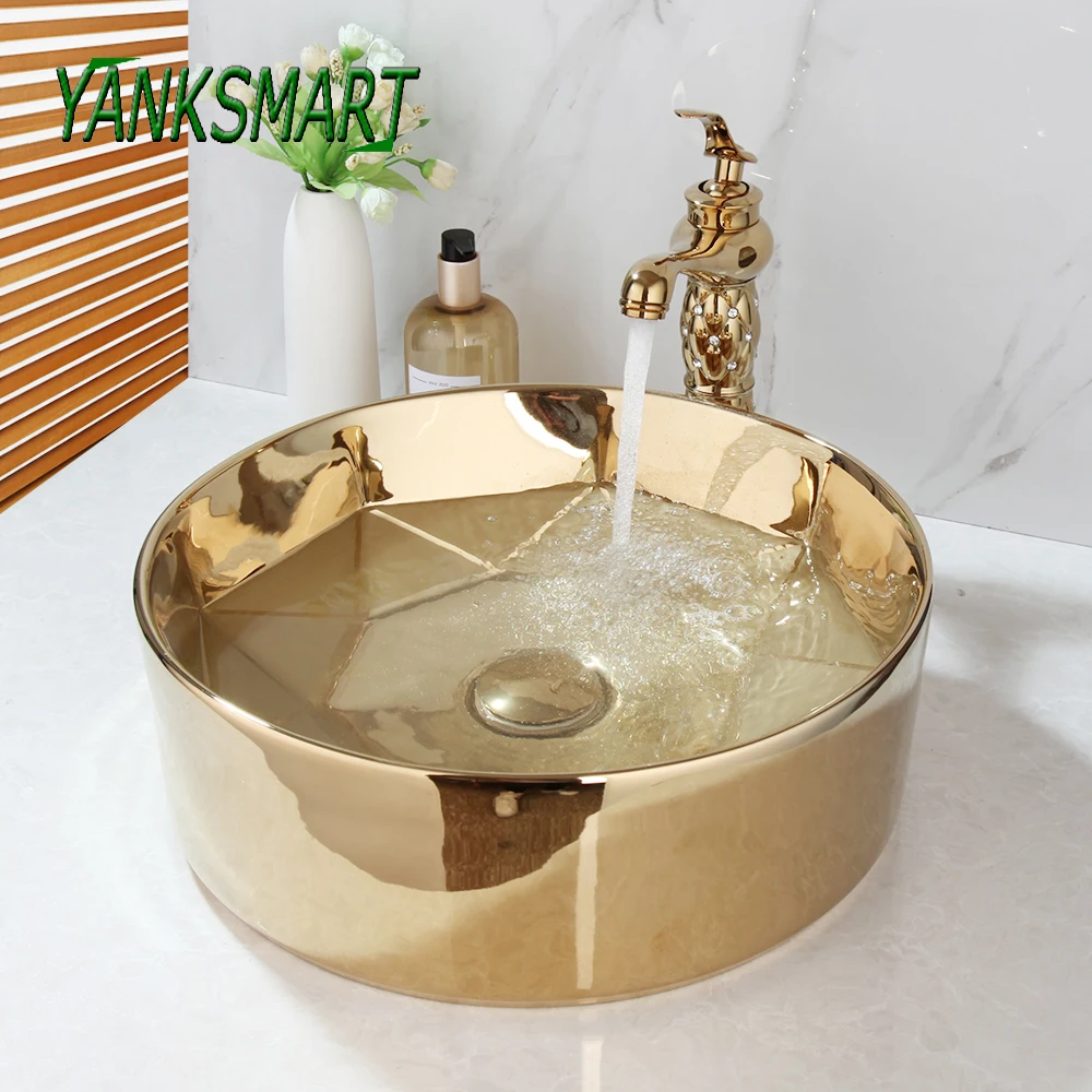 

Круглый золотой керамический смеситель для ванной комнаты YANKSMART, смеситель для раковины с выдвижным сливом, комбинированный комплект