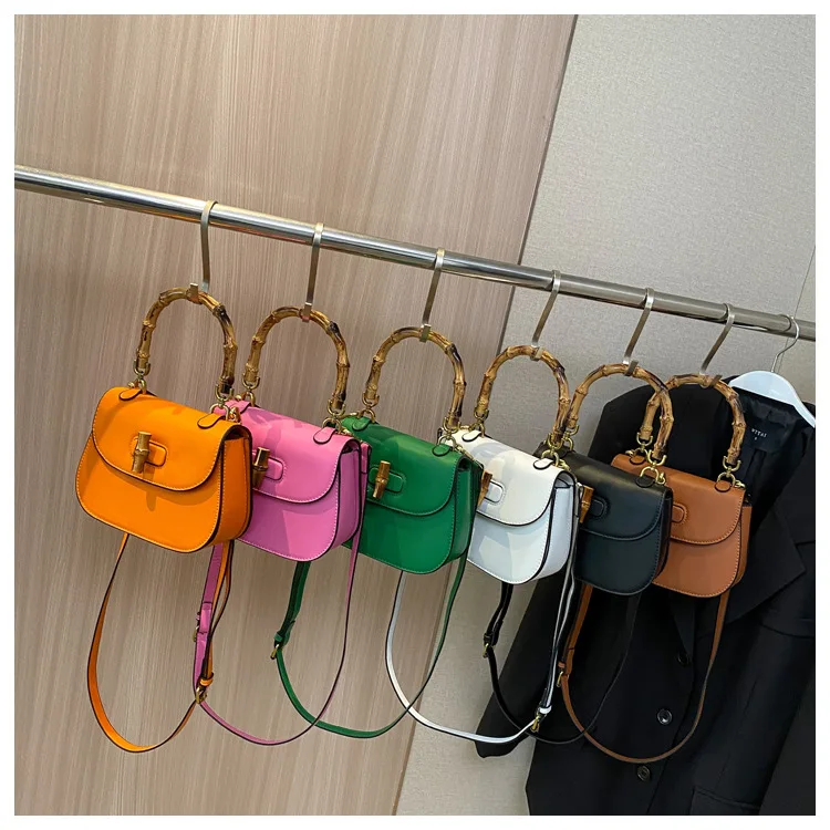 

2023 New Premium Women's Clutch Bags Fashion Unique Design bamboo handle Women Girls Premium solid color Exquisite Crossbody bag
