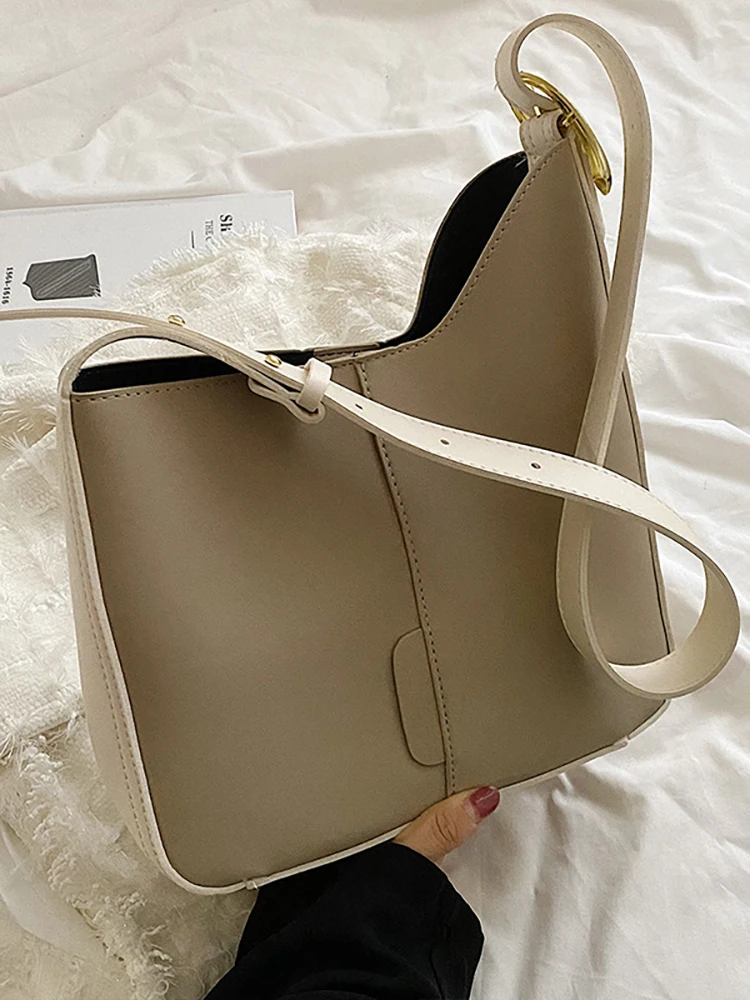 

Роскошные дизайнерские сумки для женщин, новые женские сумки через плечо из искусственной кожи, трендовая брендовая однотонная женская сумка на плечо, повседневная дорожная сумка