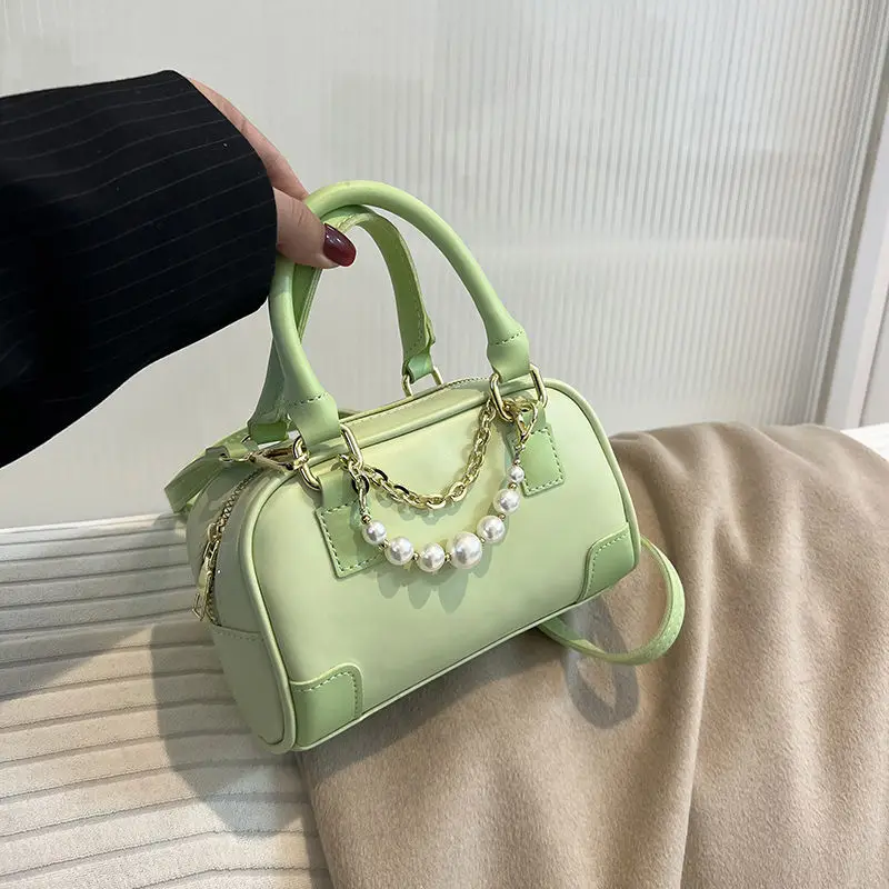 

High end bag for women in 2023, new fashion niche portable Boston pillow bag, stylish and versatile cross body bag