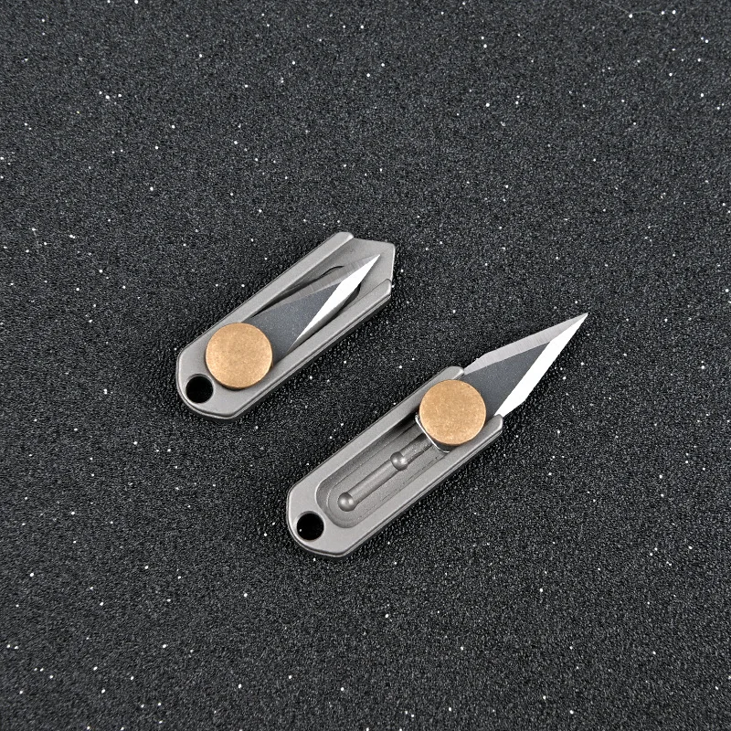 

Pure Titanium12138 Mini Push Knife Keychain Pendant Unpacking Express Opening