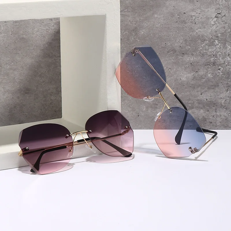 

New Frameless Women's Fashion Sunglasses Big Frame Trimming Ultra-light Round Face Thinner Sunglasses Sunshade Sunglasses Uv400
