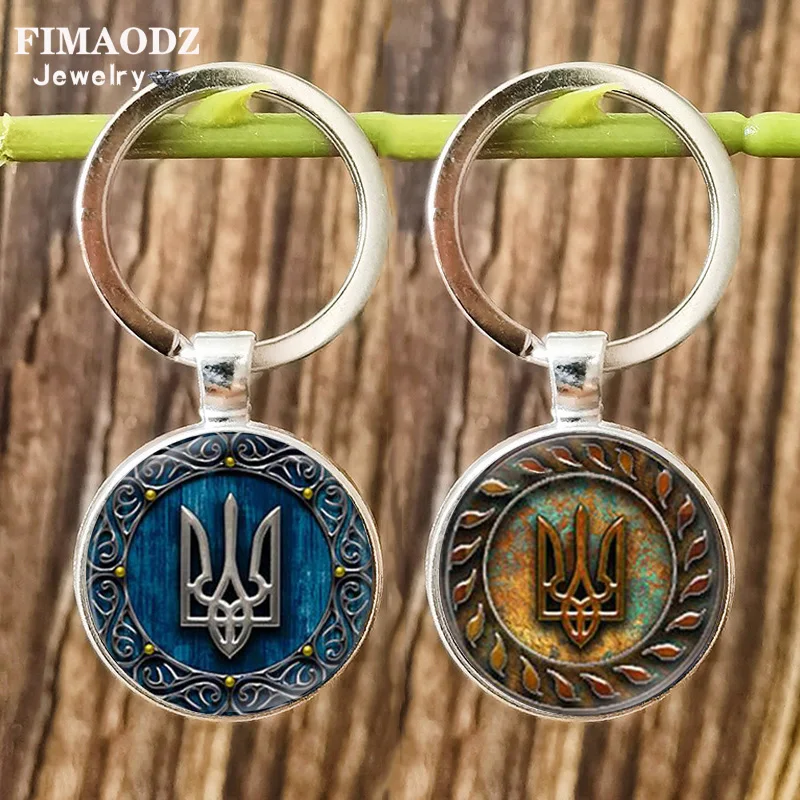 

Ретро Tryzub, Украинская модель, украшенный символом Украины, сувенир ручной работы, изысканный стеклянный купол, брелок из сплава, ювелирные и...