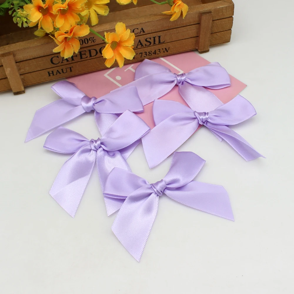 

Розовые тканевые банты 50 шт.