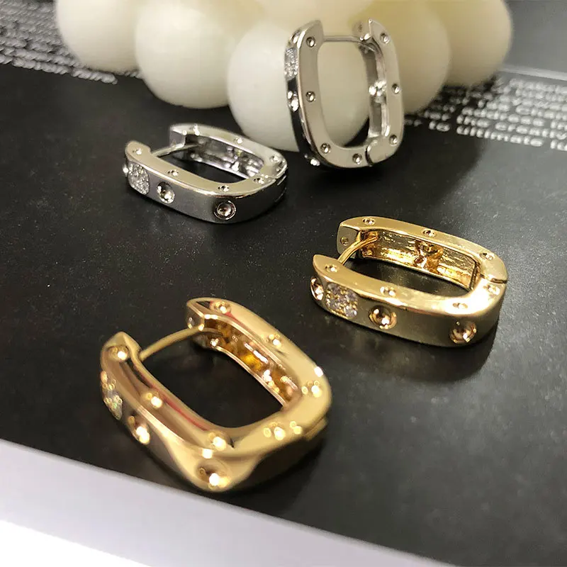 

French Earrings women's new niche design high sense light luxury simple ins cool style U-shaped metal Zircon Earrings