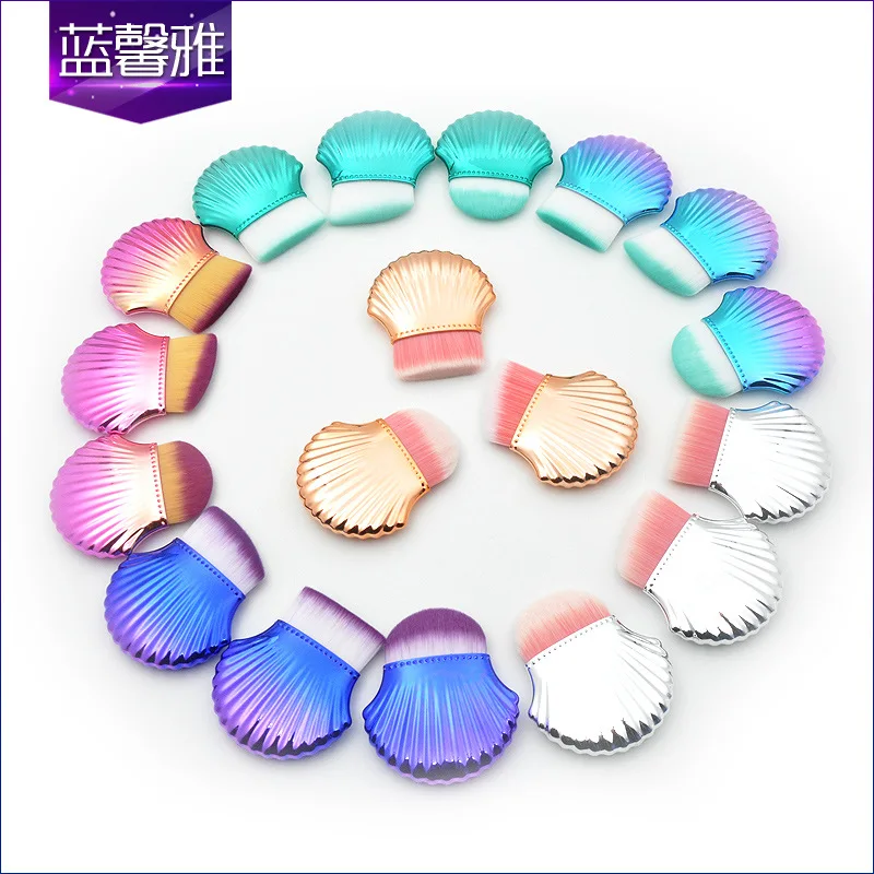 

The new single small seashells cleansing brush powdery bottom makeup brush scrub face powder paint brush flat round head