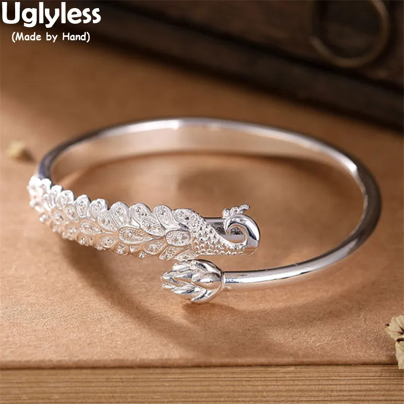 

Uglyless Delicate Carved Animals 999 Pure Silver Peacock Phoenix Bangles for Women Glossy Silver Shiny Lotus Buds Bangles Floral