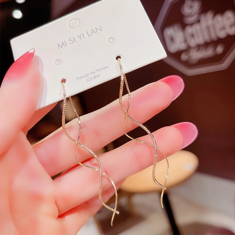 

Korean Long Super Fairy Wave Tassel Ear Line 2022 Trendy Niche Design Temperament Earrings Ins Wind Explosion Earrings Wholesale