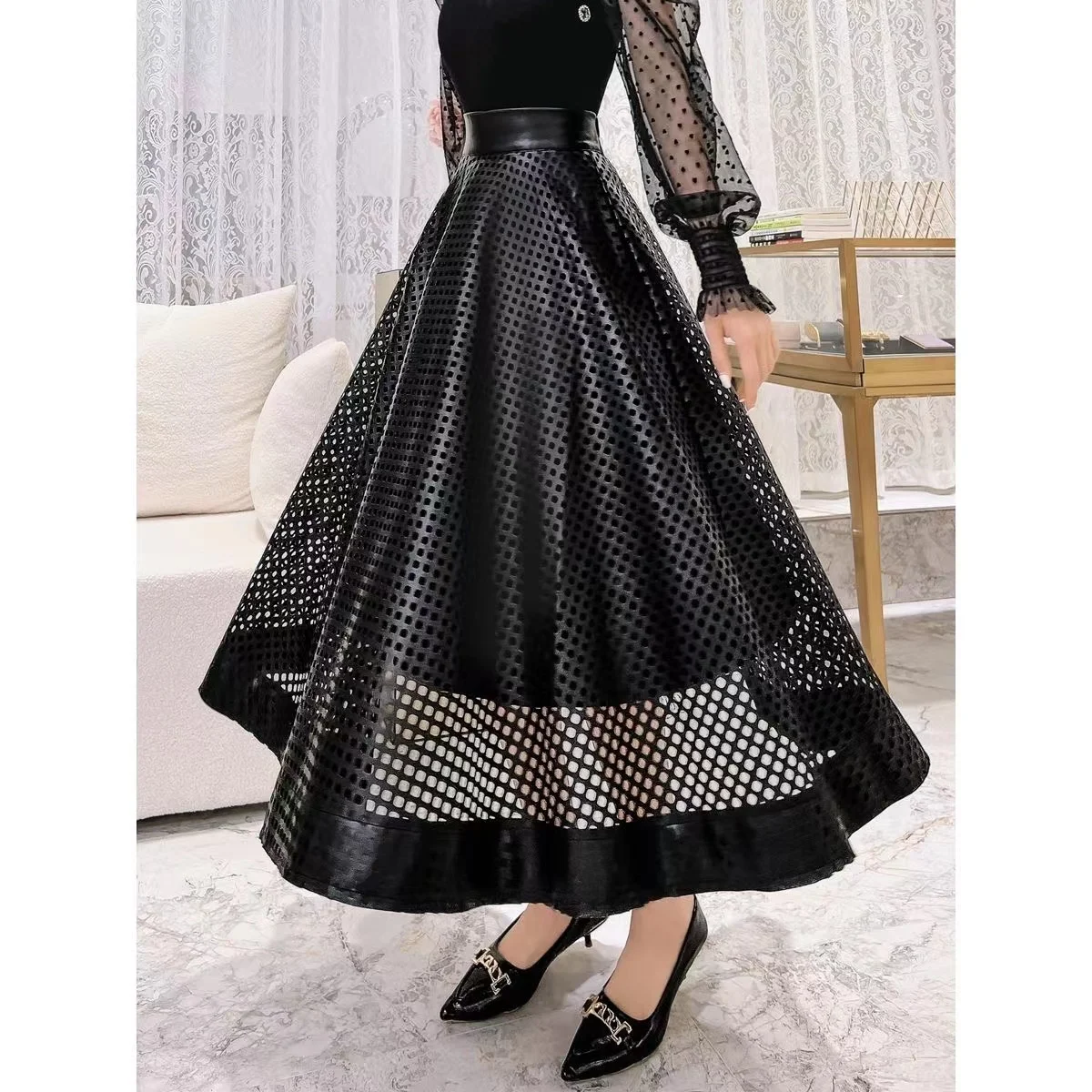 

High Waist 2023 Spring New Black White Leather Skirt For Women Niche Hollow Design Sense Long Senior Sense A-line Fashion Skirts