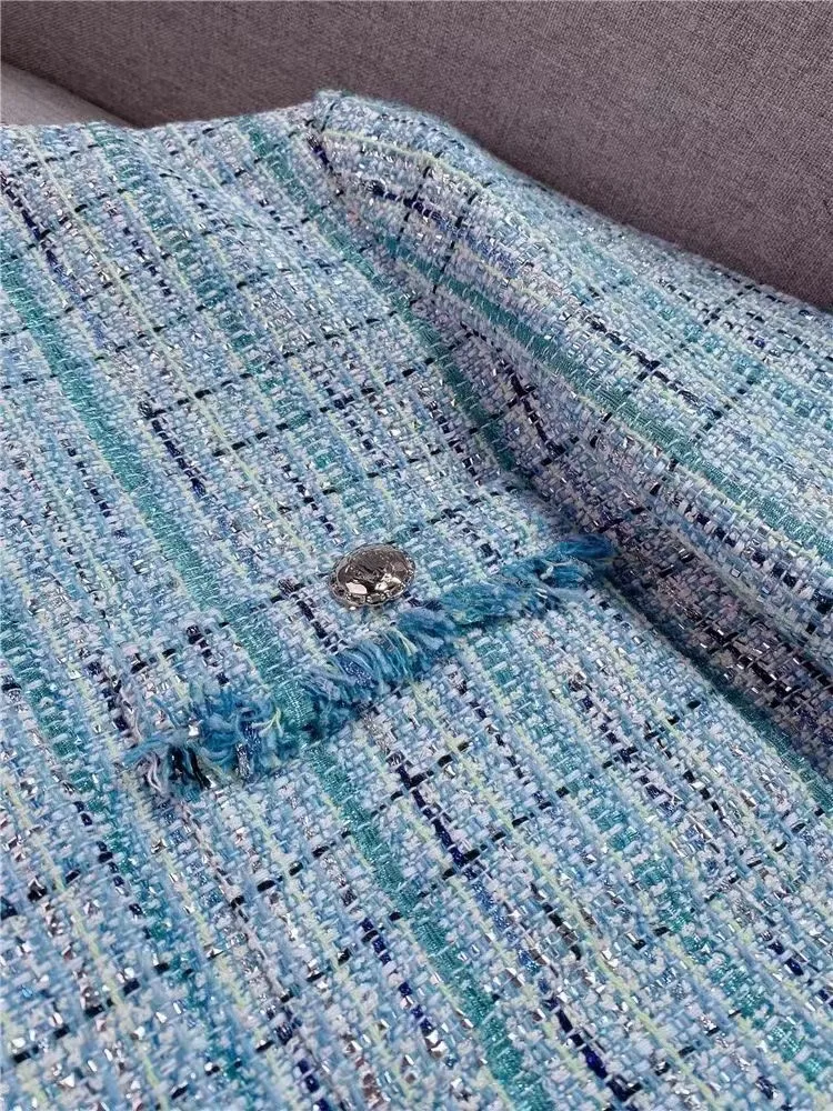 

Женская юбка с бахромой, круглым вырезом и расклешенными рукавами