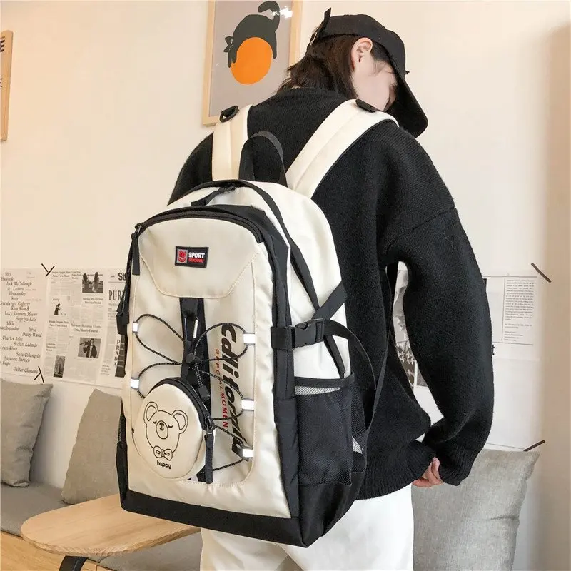 Backpack male high school student bag Korean street style backpack female Japanese Harajuku work clothes