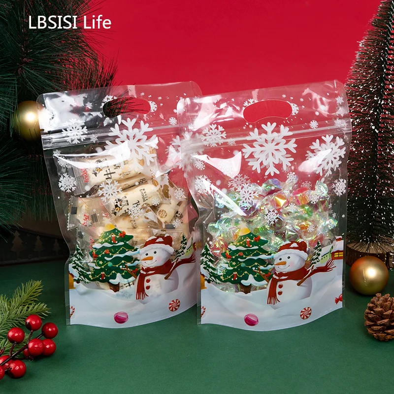 

LBSISI Life 50pcs Christmas Candy Gift Transparent Snowflak Bag packaging Cookies Snack Spring Festival Kids Party Suppliy