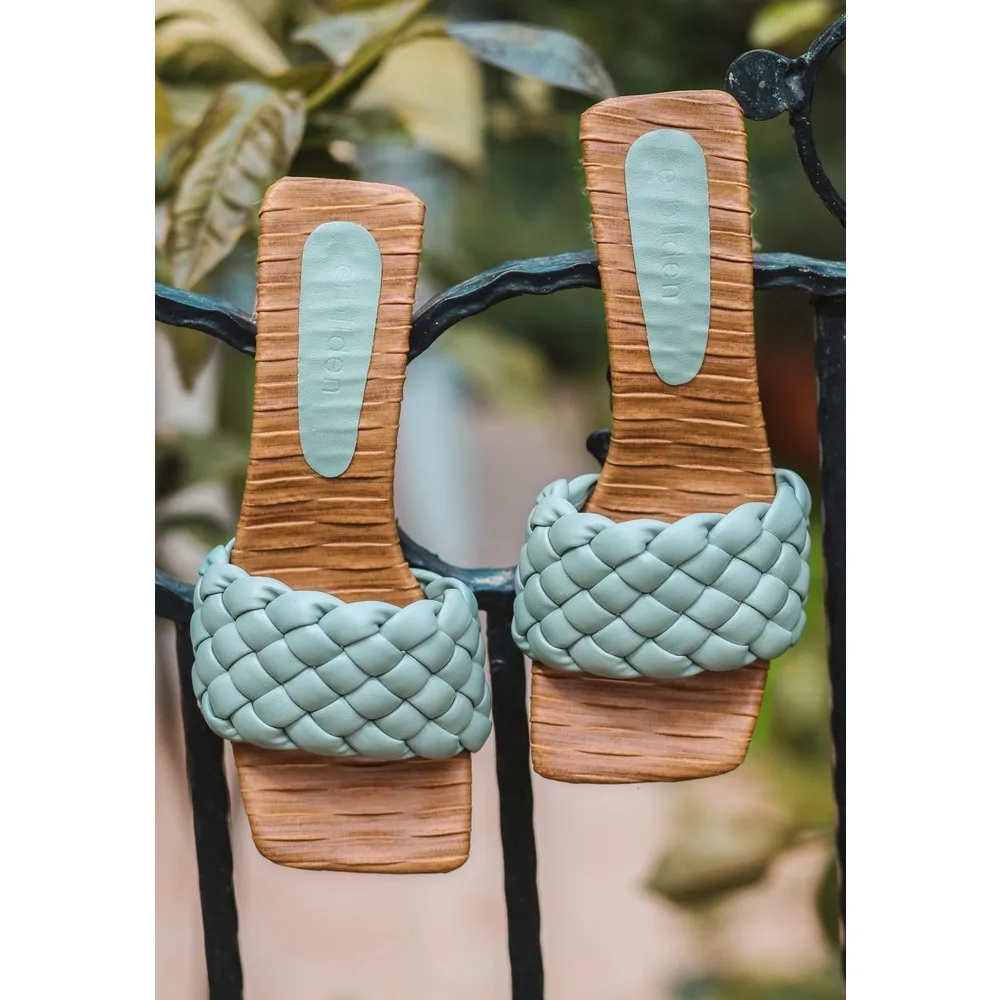 

Dorlie Dong Turquoise Skin Heels Slippers