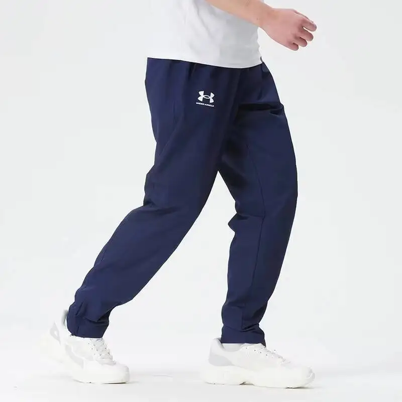 Фото Новые прямые брюки Under Armour Navy Slim для женщин и мужчин из гладкой ткани, повседневные брюки, универсальные деловые брюки для повседневной носки 1390150-410 №3