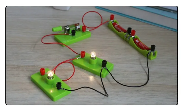 Students simple circuit science experiment light bulb lamp holder switch battery box wire fourth grade classroom