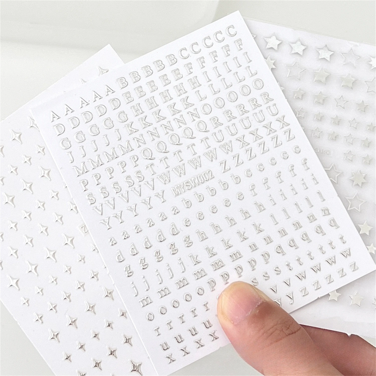 

Набор наклеек с серебряной звездой