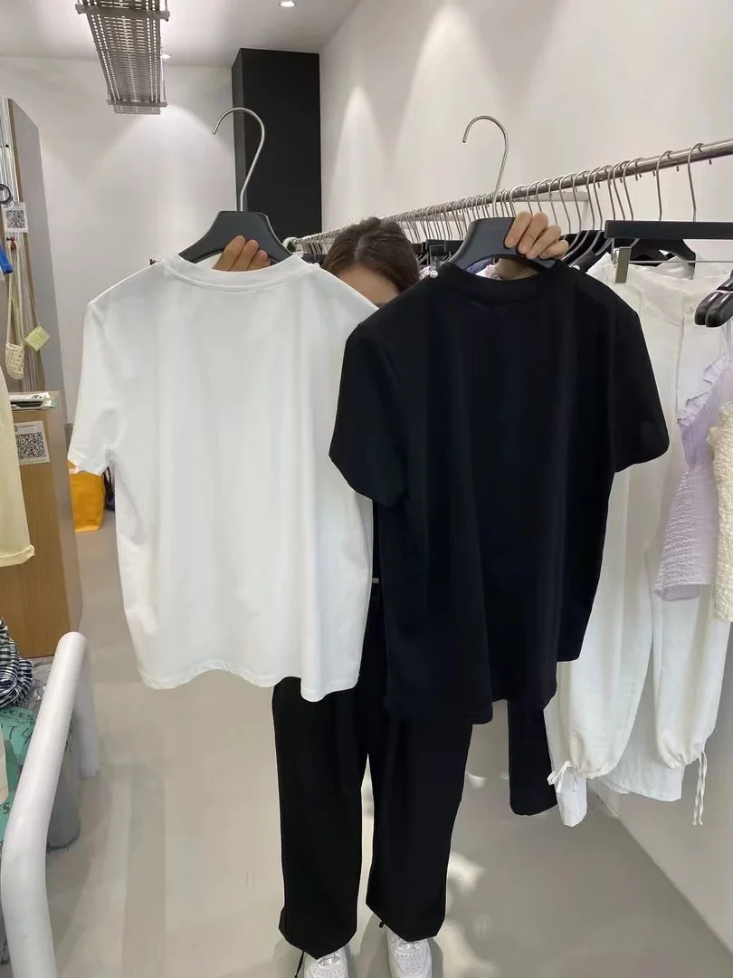 Женская свободная футболка с бусинами