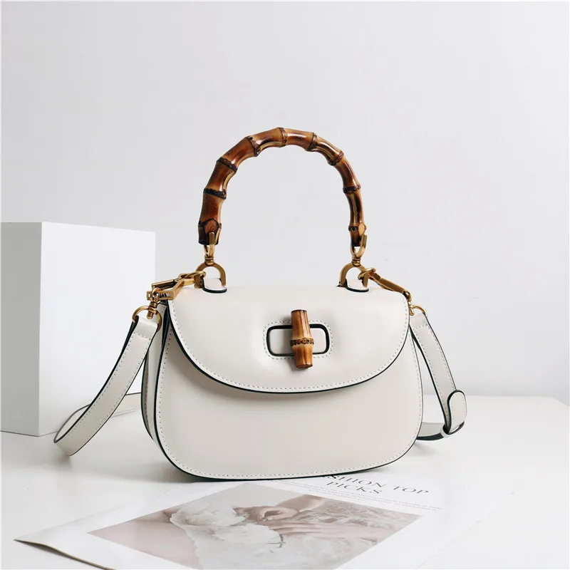 

Сумка кросс-боди женская из натуральной кожи с бамбуковыми ручками