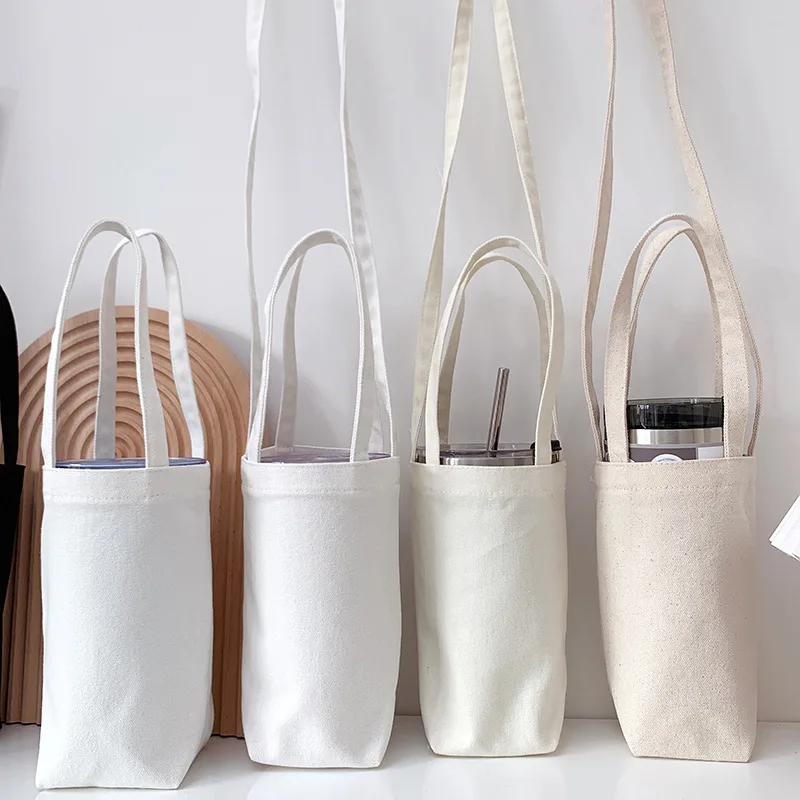 

Portable Water Bottle Storage Bag Canvas Travel Cup Drink Bottle Hanging Holder With Strap Insulator Sleeve Bag Multifunctional