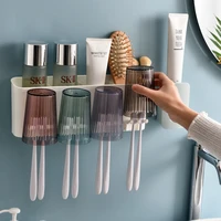 wall mounted toothbrush rack punch free automatic toothpaste squeezing device mouthwash toothbrush cup toilet storage box set