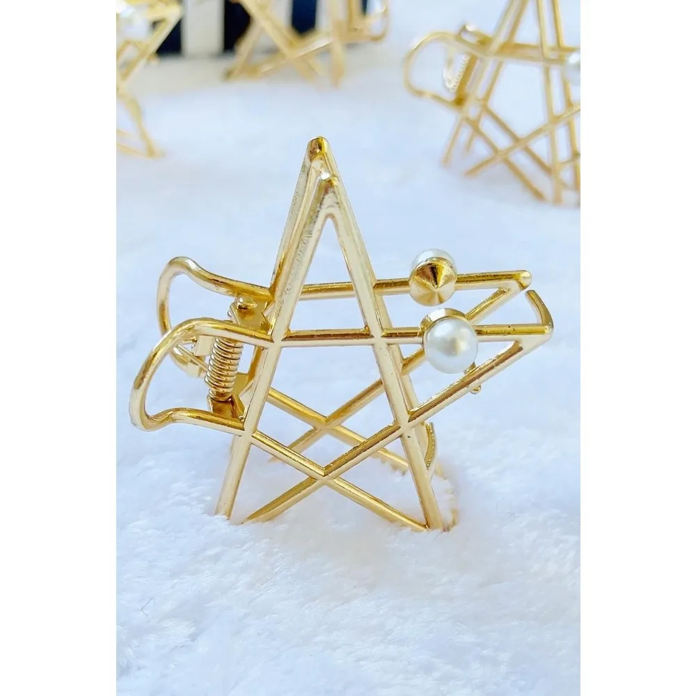 

Металлическая трещотка Dorlie с жемчужной звездой золотого цвета
