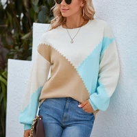 2022 autumn and winter new european and american contrast color round neck sweater temperament lantern sleeve sweater women