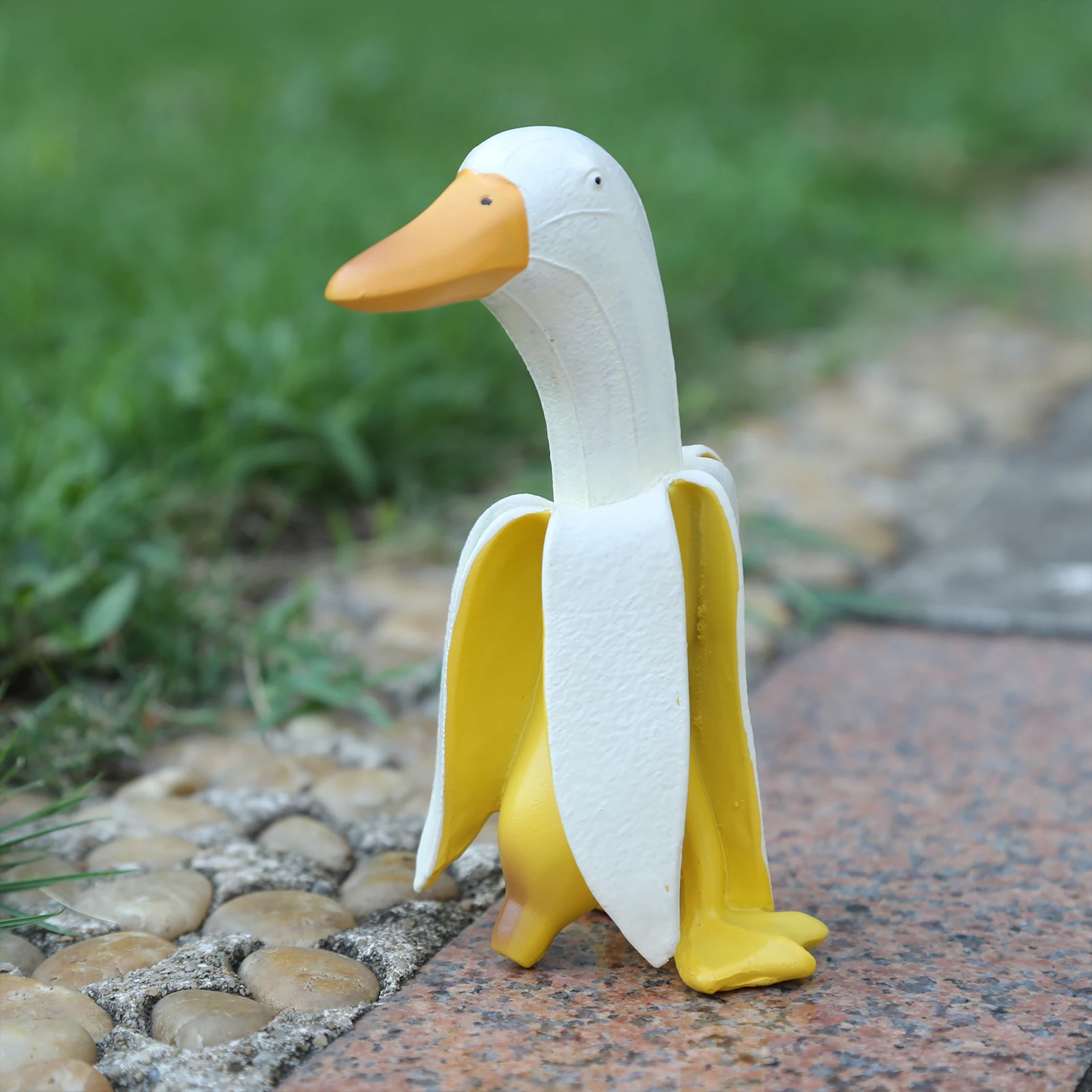 

Banana Duck Statue Garden Yard Decoration Sculptures Creative Funny Duck Miniatures Figurines for Home Desk Decoration Ornaments