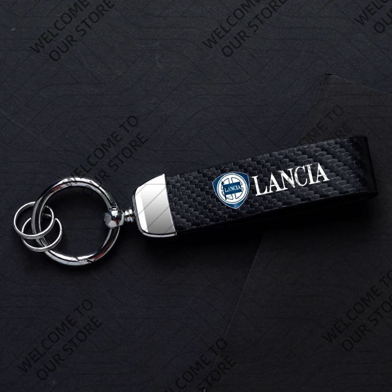 

Новая мода для LANCIA YPSILON KAPPA DELTA MUSA LYBRA логотип автомобиля кожаный брелок из углеродного волокна цинковый сплав брелок для ключей аксессуары
