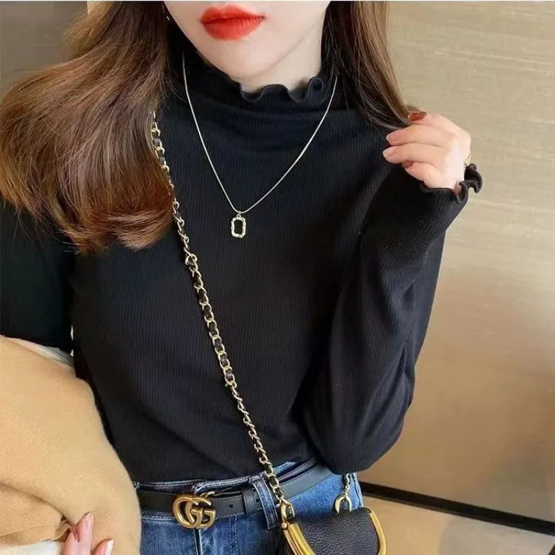 Женские пуловеры с воротником-хомутом и боковой нитью