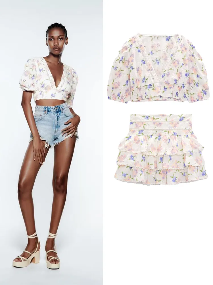 

Summer new women's V-neck puff sleeves hollow embroidered print top + multi-layer hem mini skirt