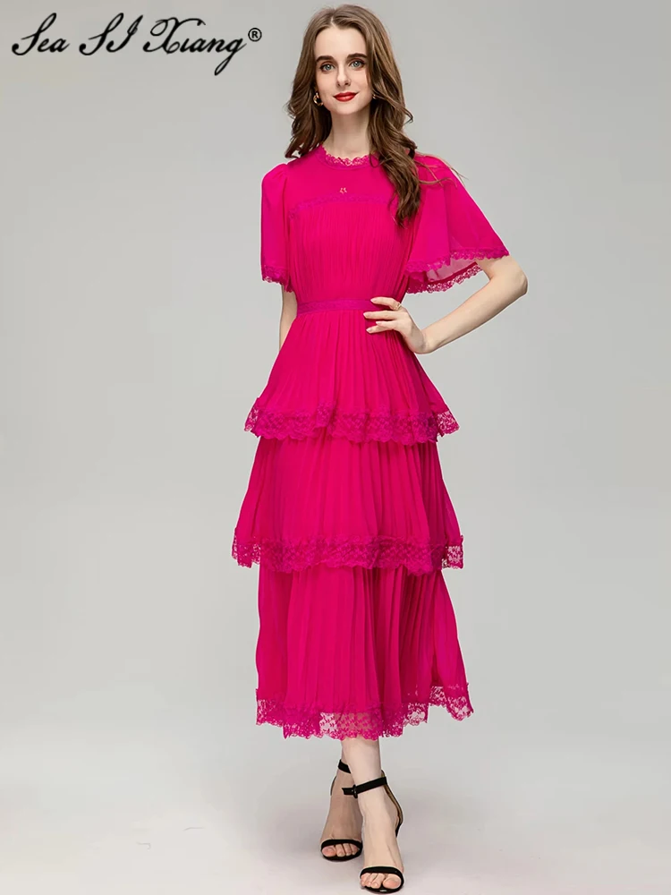 

Женское летнее платье с круглым вырезом, расклешенными рукавами и оборками