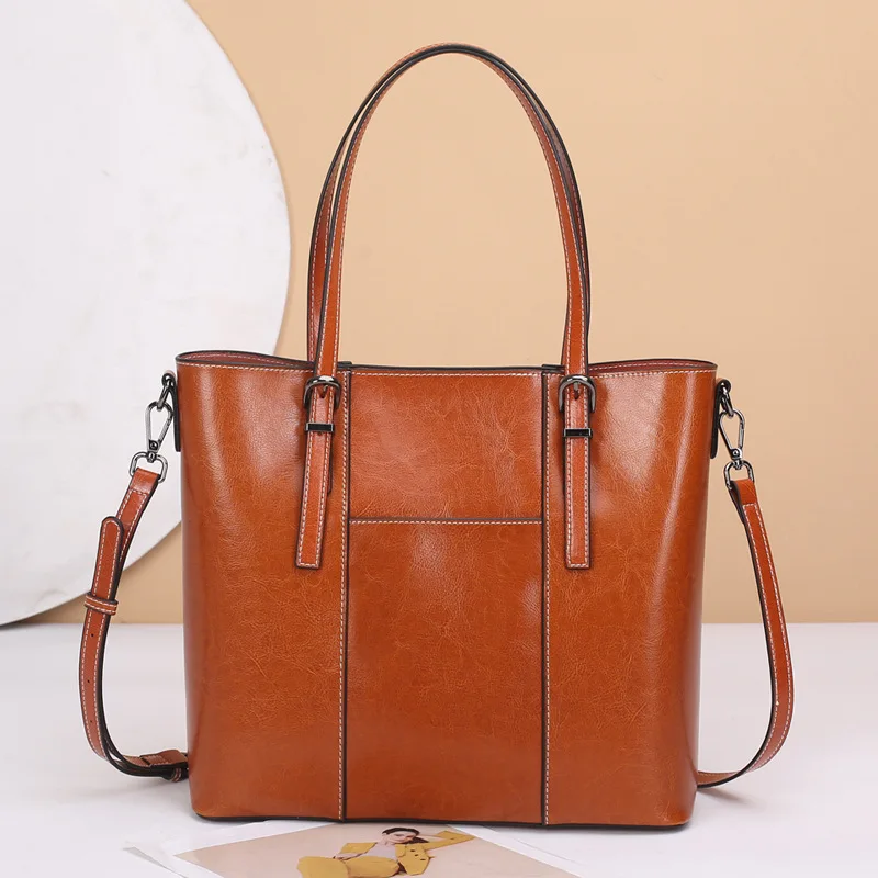 

The new 2023 leather female bag senior feeling one shoulder bag joker high-capacity tottenham cowhide ms inclined shoulder girl