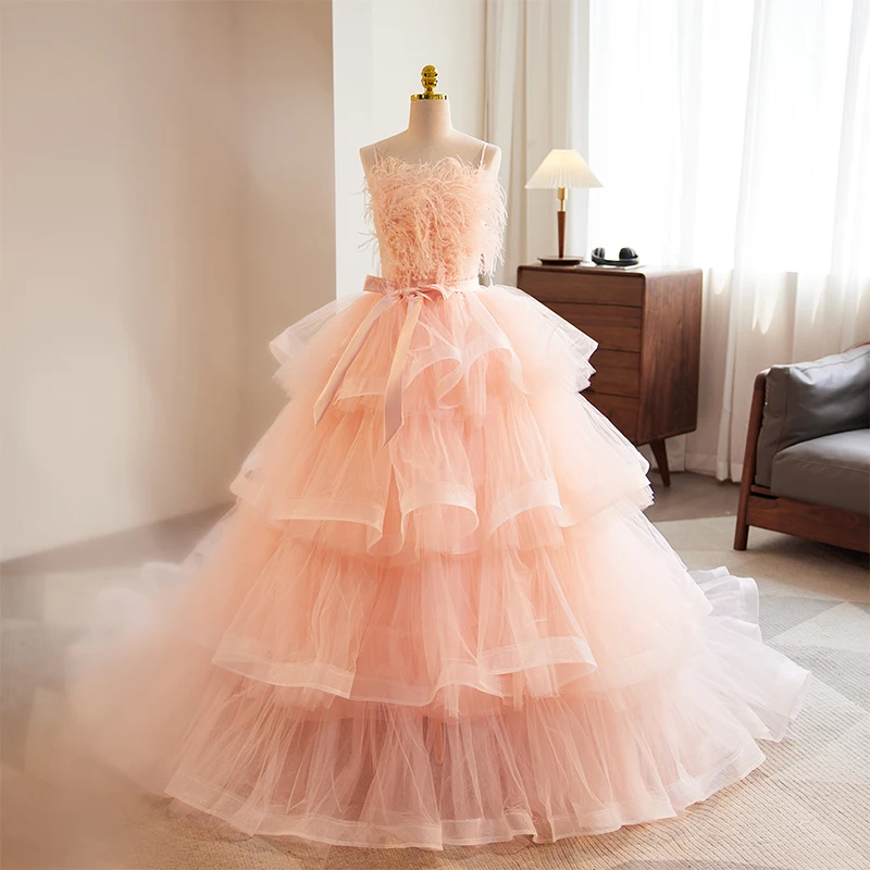 

Pink Spaghetti Strap Quinceanera Dress 2023 New Sweet Feathers Princess Ball Gown Sleeveless Tulle Tiered Vestido De Casamento