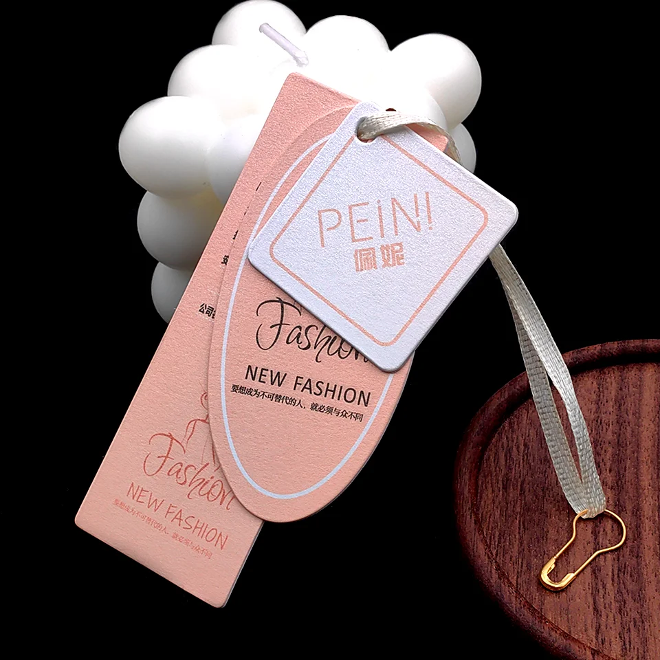 

Custom LOGO Luxury Multiple Layers Hanging Label with Ribbon Slings Special Swing Paper Product Oval Hang Tags for Clothing