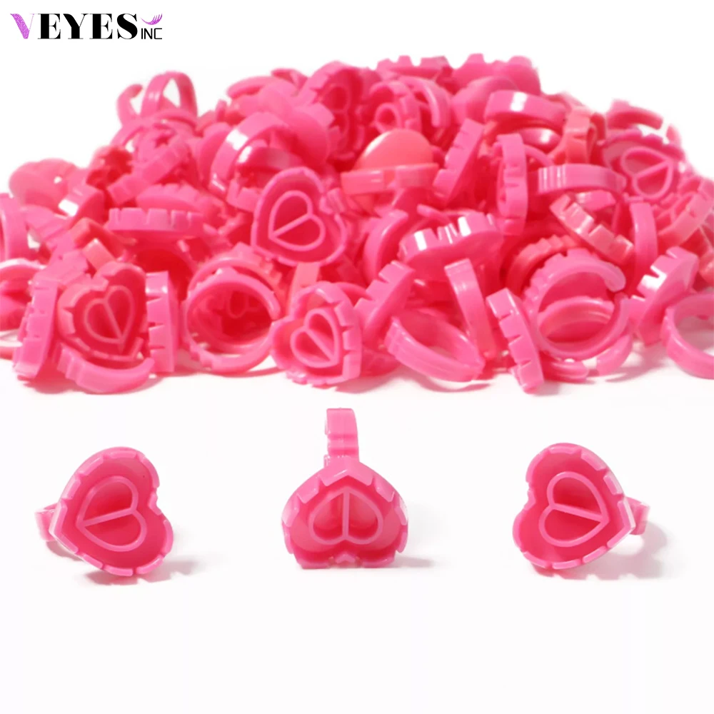 

Veyes Inc Eyelash Extensions 100 PCS Heart Shape Glue Ring Cup Veyelash Lash Glue Holder Colored Plastic Glue Cup for Makeup