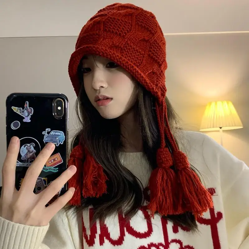 

New Year's Red Hat Women's Autumn and Winter Warm Wool Tassel Pullover Christmas Hat Hand knitted Ear Protection Hat Japanese