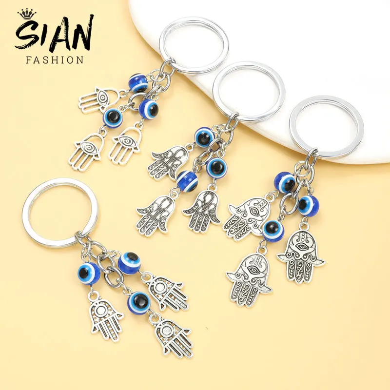

Fashion Blue Turkish Evil Eye Beads Key Chain Lucky Eyes Fatima Hand Metal Keychain Women Men Backpack Car Key Accessories Gift