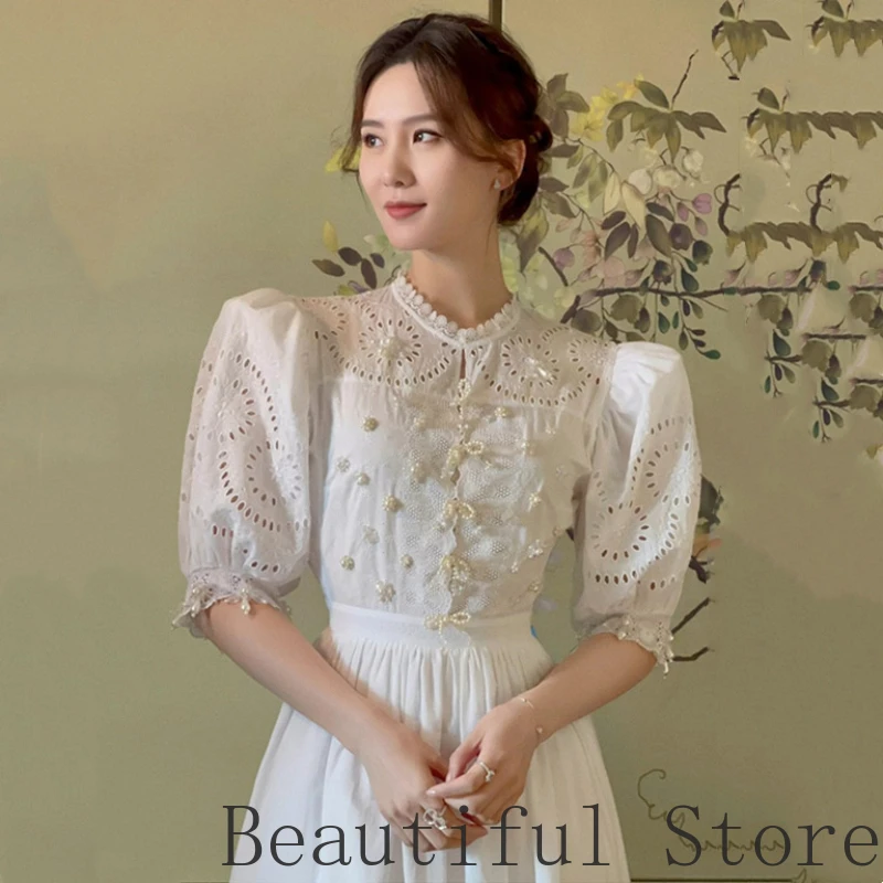 

Luxury Designer fashion new style Hollowed out white dress for women bishop sleeve Embroidery temperament woman dresses