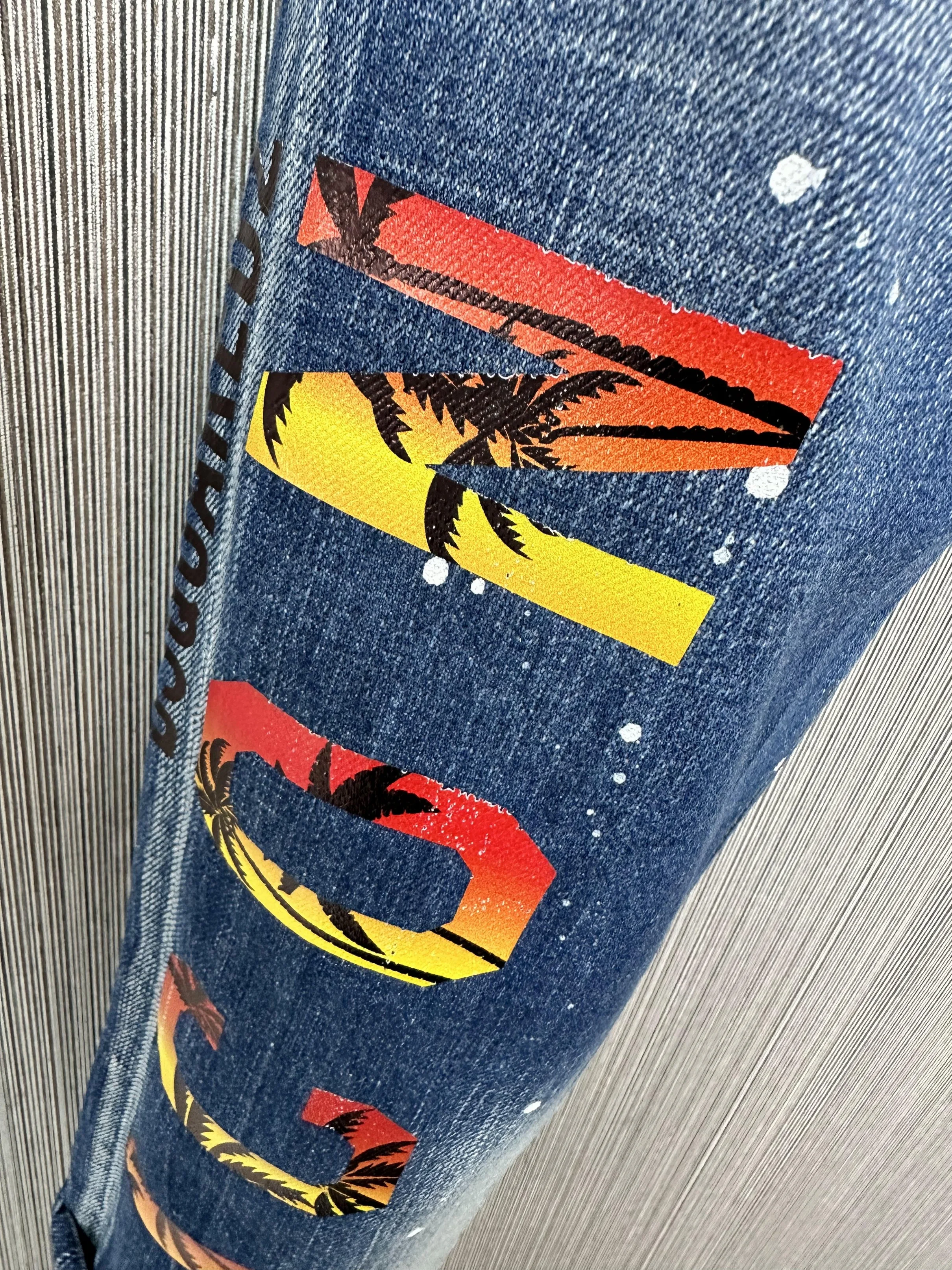 2023 New D2 Jeans Men's Fashion Wear and Tear Patch Ink Bleached Slim Fit Elastic Feet Men's Button