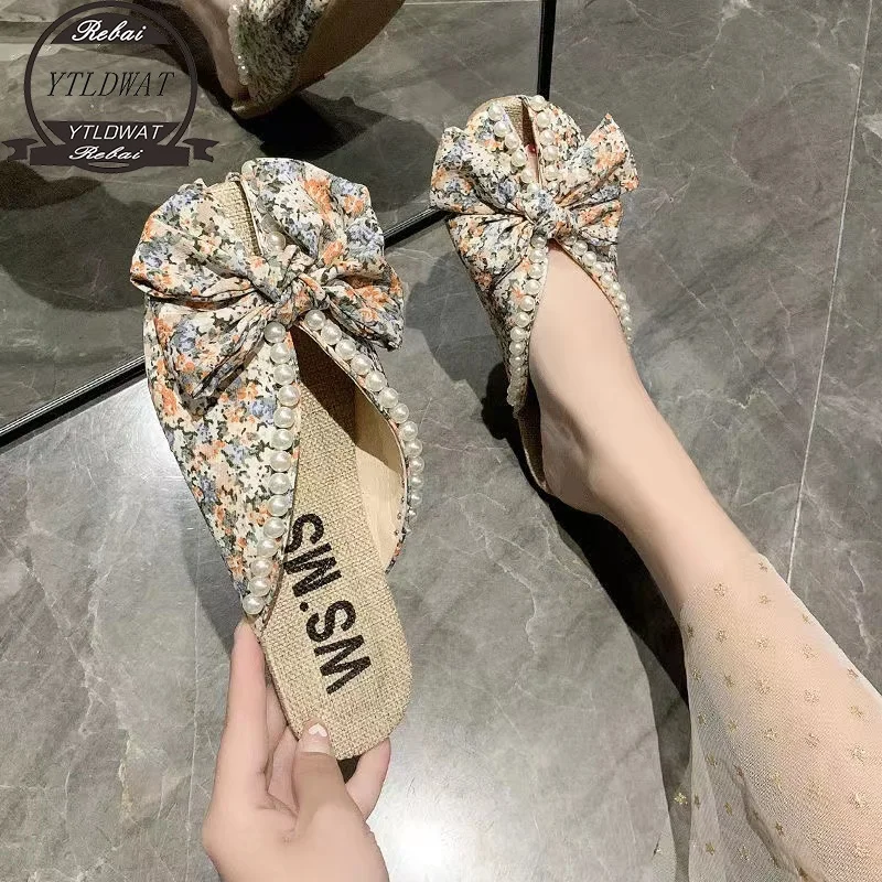 

Обувь Fairy Bow Pearl Flat Sole Single Shoes Women's Soft Sole 2022 Лето Новые полутапочки Baotou Тапочки из искусственной кожи на плоской подошве с