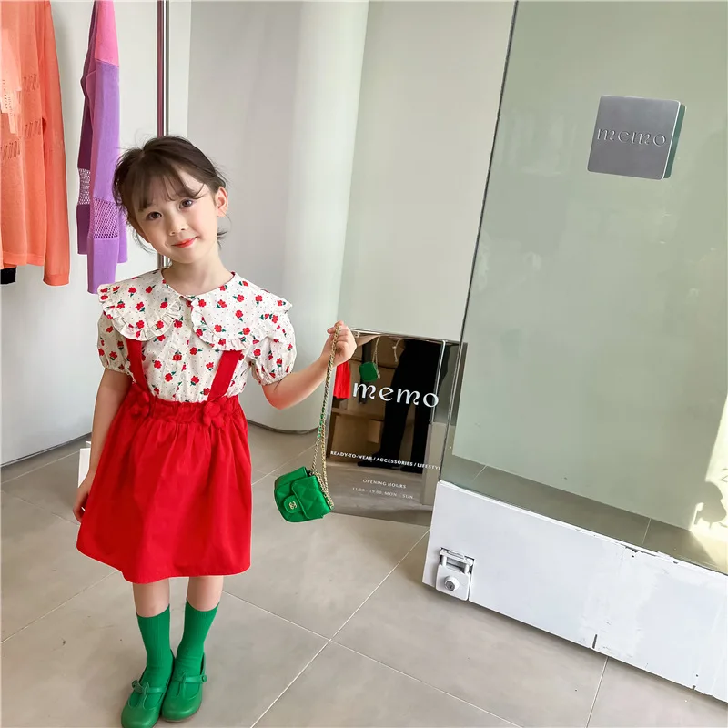 

Summer Girls Small Fresh Floral Large Lapel Short Sleeve Shirt + Flower Shaped Strap Skirt Two-piece Skirt