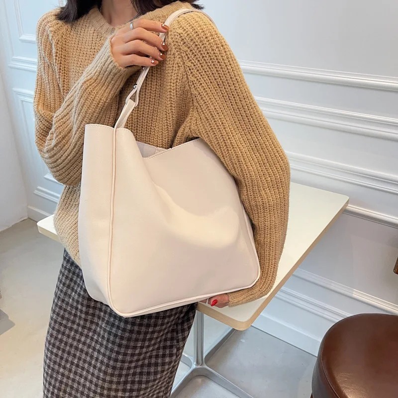 2023 New Women's Handbag Fashion Brand Shoulder Bag Versatile Shopping and Travel Bag Large Capacity Fashion Leather Women's Bag