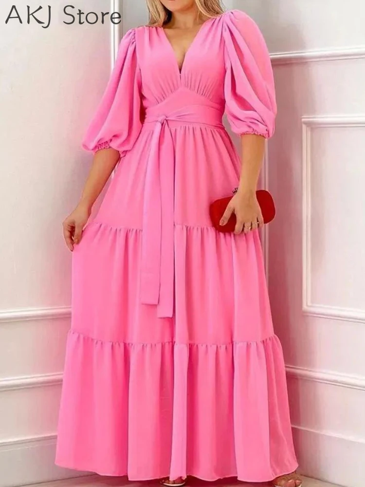 

Женское платье макси с пышными рукавами и глубоким V-образным вырезом