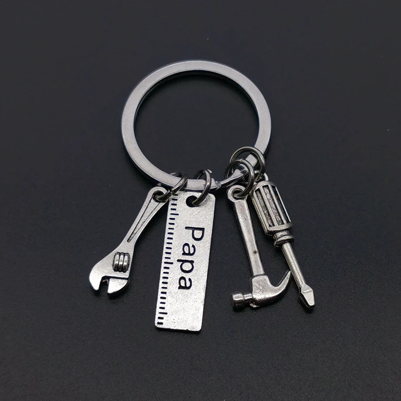 

Hot Keychains for Men Car Bag KeyRing Combination Tool Portable Mini Utility Pocket Clasp Ruler Hammer Wrench Pliers Shovel