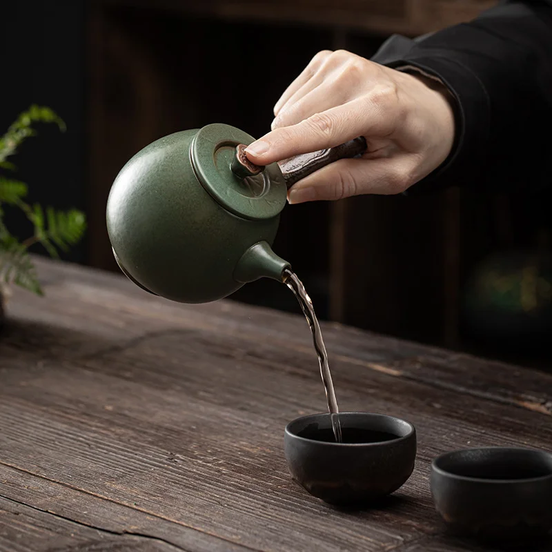 

ceramic China household kung fu tea set tea retro single with filter clay pot side handle