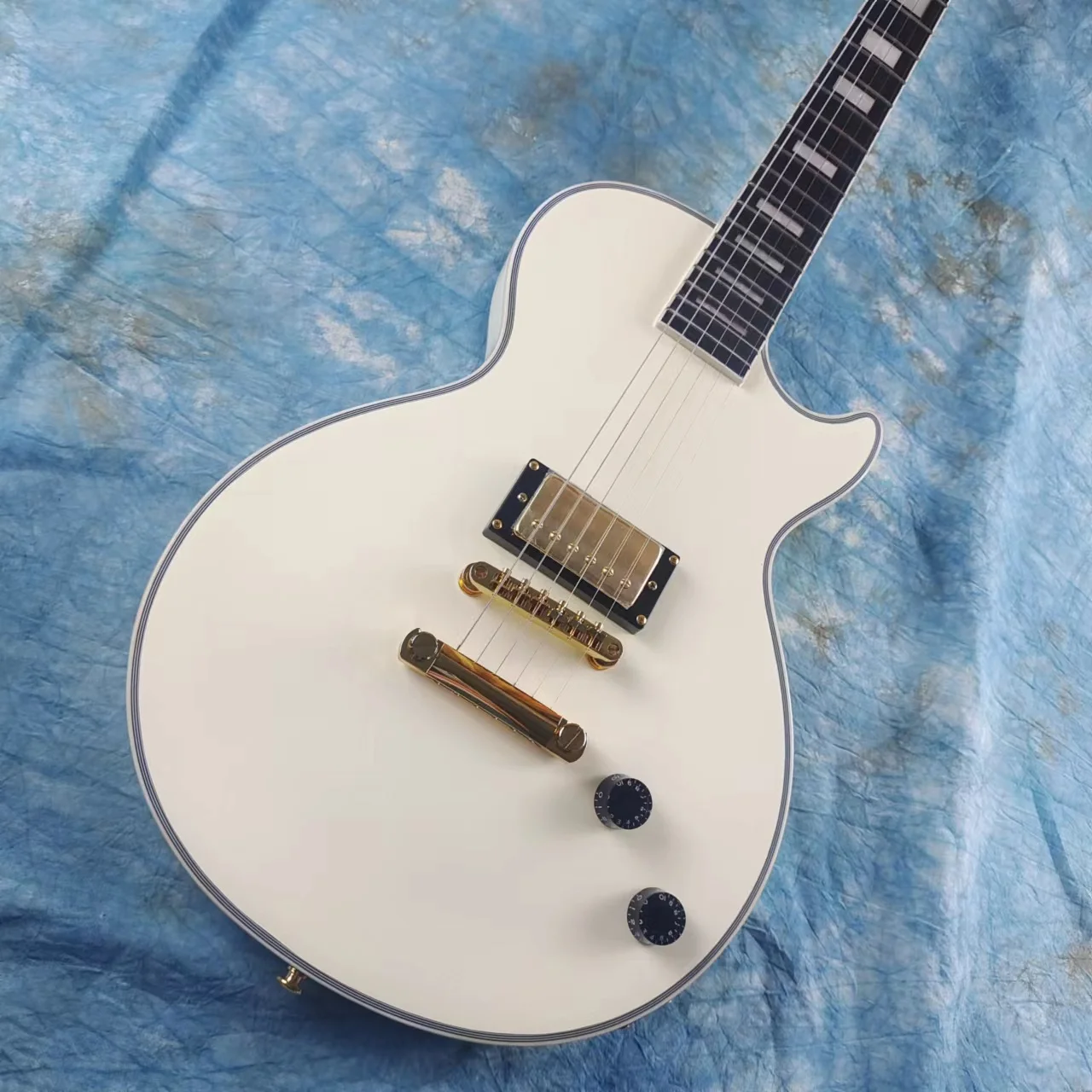 

Customized electric guitar, ebony fingerboard+fingerboard binding, gold accessories, available for shipping