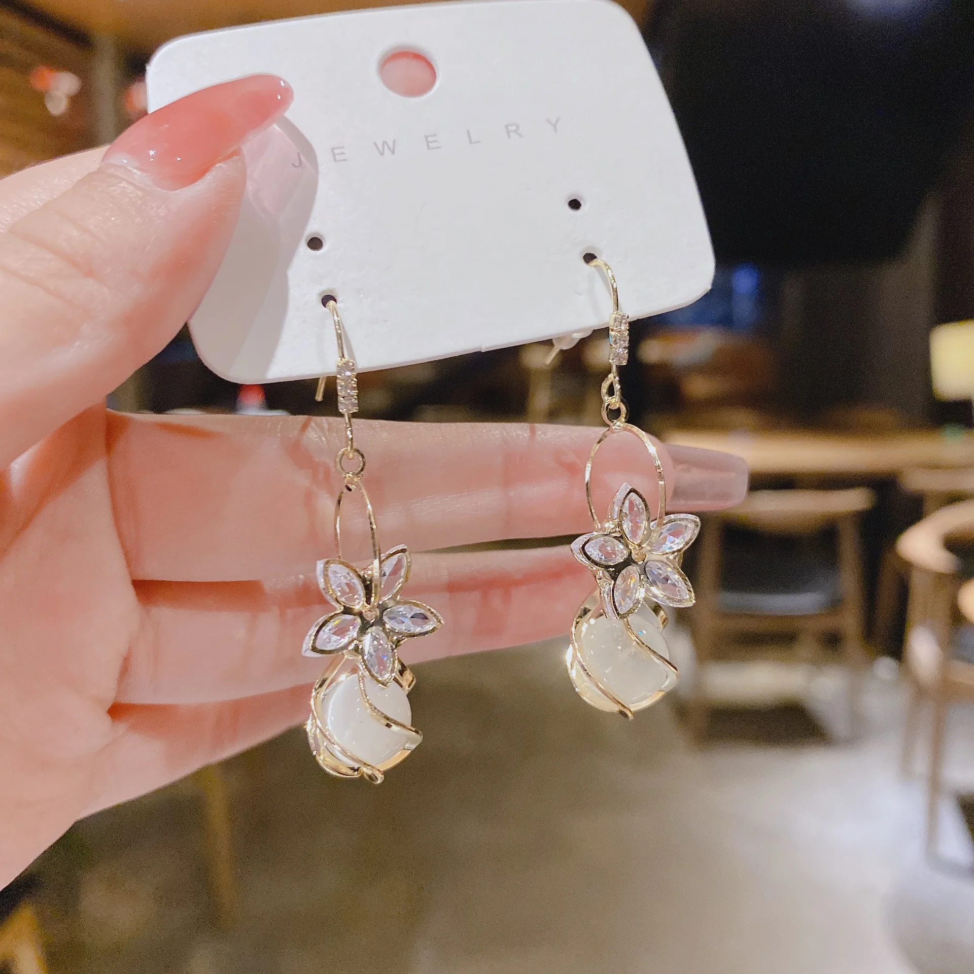 

Korean net red earrings women 2022 new magenta opal temperament ear hook feminine flower earrings trend